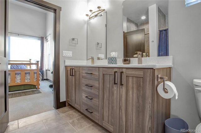 1111 E St, Salida, CO 81201 - bathroom with double vanity and tile patterned floors