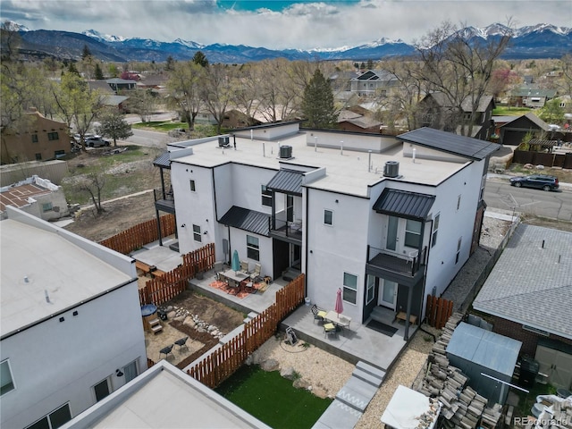 1111 E St, Salida, CO 81201 - aerial view of residential area with mountains