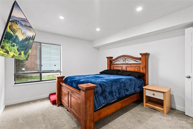 bedroom with light carpet, baseboards, and recessed lighting