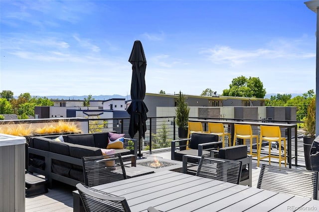 4950 Lowell Blvd, Denver, CO 80221 - wooden terrace featuring an outdoor living space with a fire pit and outdoor dining space