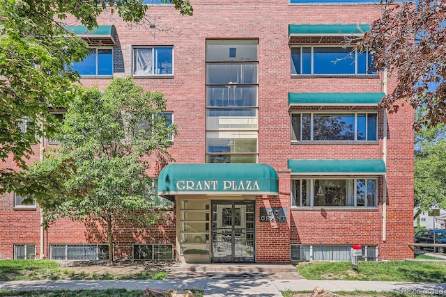 view of property featuring central AC unit