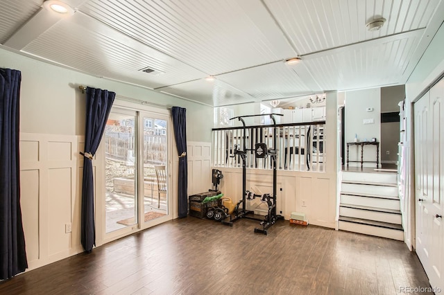 workout room featuring wood finished floors