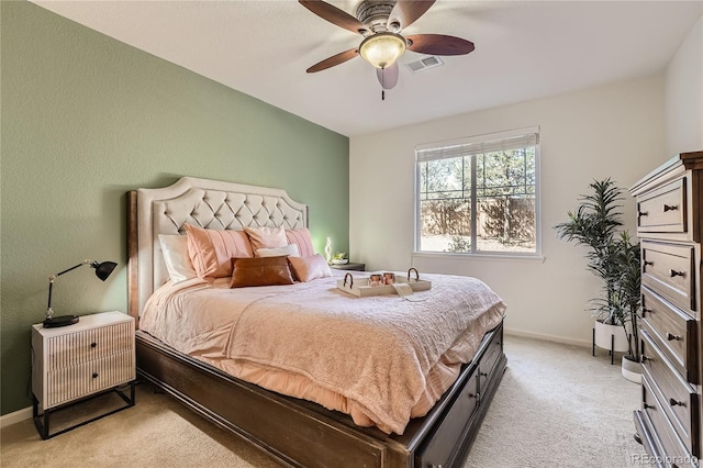 803 E 98th Ave Unit 105, Thornton, CO 80229 - bedroom with light carpet, baseboards, and ceiling fan