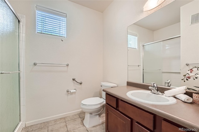 803 E 98th Ave Unit 105, Thornton, CO 80229 - full bath featuring an enclosed shower, toilet, baseboards, vanity, and tile patterned flooring