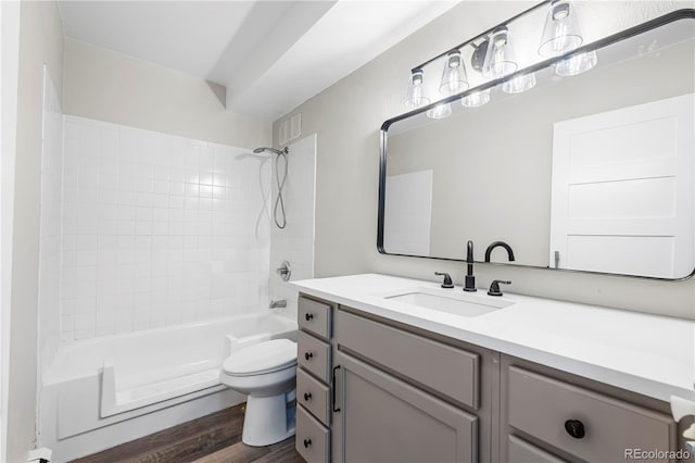 795 S Alton Way Unit 11C, Denver, CO 80247 - full bath with vanity, toilet, tub / shower combination, and wood finished floors