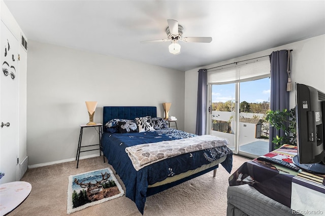 3191 S Holly Pl, Denver, CO 80222 - carpeted bedroom with access to exterior, a ceiling fan, and baseboards
