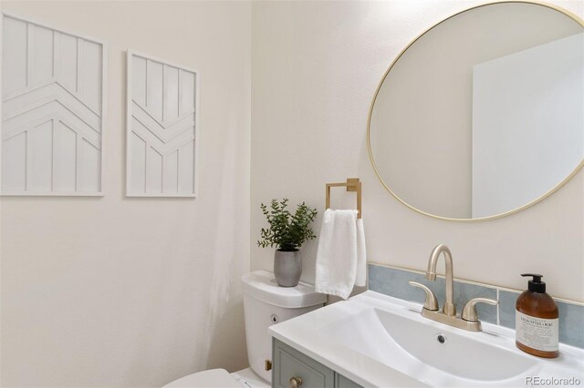 1411 Acacia Dr, Colorado Springs, CO 80907 - bathroom featuring toilet and vanity