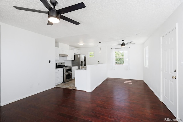 1455 W Alaska Pl, Denver, CO 80223 - unfurnished living room with ceiling fan, hardwood / wood-style flooring, and a textured ceiling