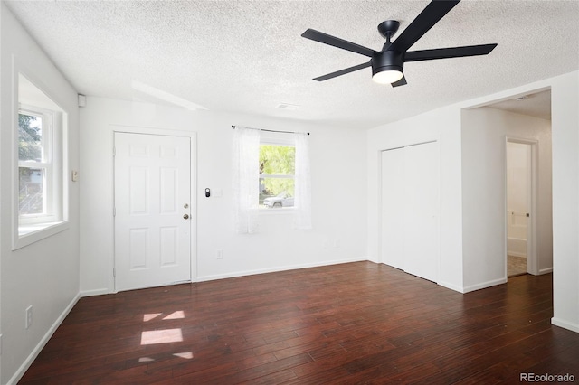1455 W Alaska Pl, Denver, CO 80223 - unfurnished room featuring a textured ceiling, hardwood / wood-style floors, and a ceiling fan