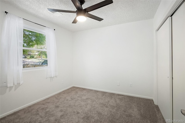 1455 W Alaska Pl, Denver, CO 80223 - unfurnished bedroom featuring a textured ceiling, a closet, carpet flooring, and ceiling fan