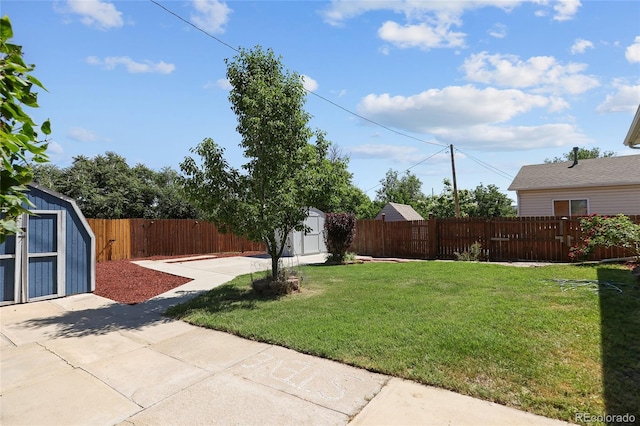 1455 W Alaska Pl, Denver, CO 80223 - fenced backyard featuring a storage unit