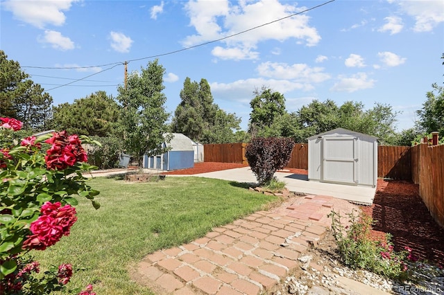 1455 W Alaska Pl, Denver, CO 80223 - fenced backyard with a storage unit