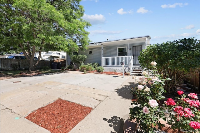 1455 W Alaska Pl, Denver, CO 80223 - view of front of house featuring a porch