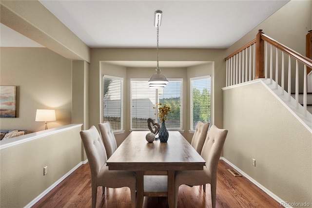 3232 Cimarron Pl, Superior, CO 80027 - dining space with wood finished floors and stairway