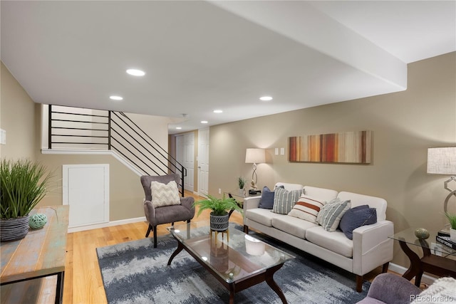 3232 Cimarron Pl, Superior, CO 80027 - living room with wood finished floors, stairway, and recessed lighting