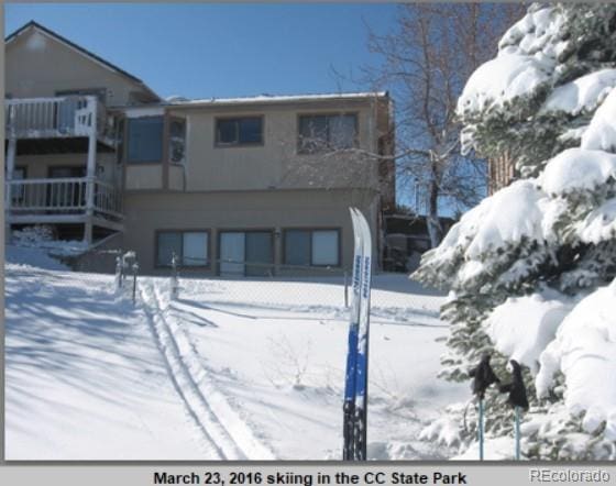 11323 E Cimmarron Dr, Englewood, CO 80111 - view of front of home featuring an attached garage