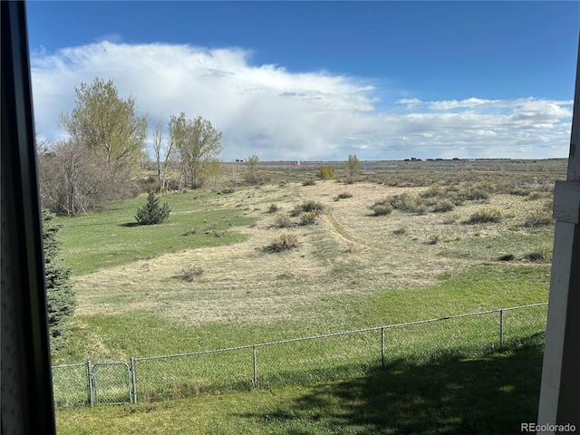 11323 E Cimmarron Dr, Englewood, CO 80111 - view of yard featuring a gate, fence, and a rural view