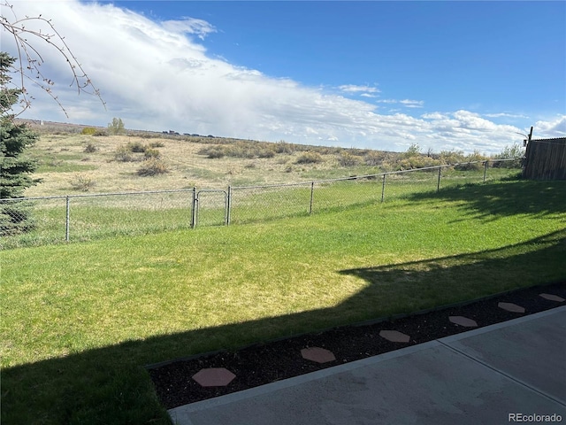 11323 E Cimmarron Dr, Englewood, CO 80111 - view of yard with fence and a rural view