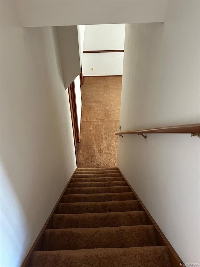 11323 E Cimmarron Dr, Englewood, CO 80111 - stairway with carpet floors
