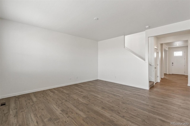 18162 Coppermallow Trl, Parker, CO 80134 - unfurnished room featuring wood finished floors
