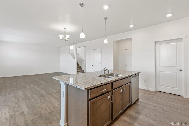 18162 Coppermallow Trl, Parker, CO 80134 - kitchen with dishwasher, light wood-type flooring, pendant lighting, and recessed lighting