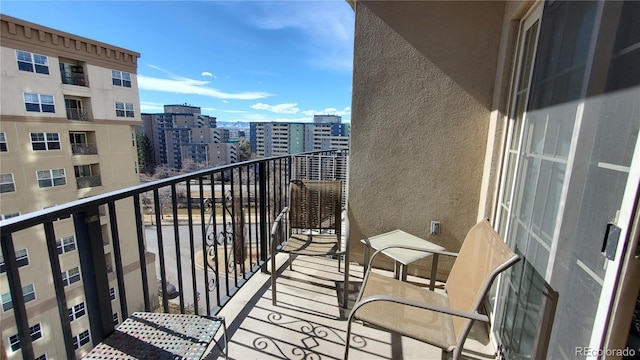 balcony featuring a city view