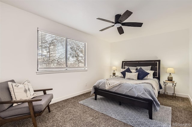 bedroom featuring ceiling fan and dark colored carpet