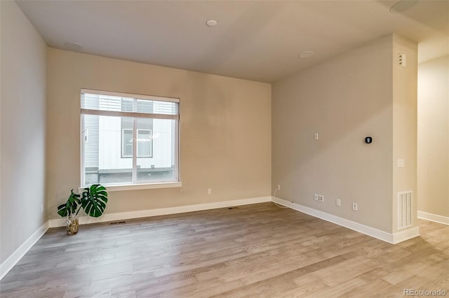 5185 Vivian St, Wheat Ridge, CO 80033 - empty room featuring wood finished floors and baseboards