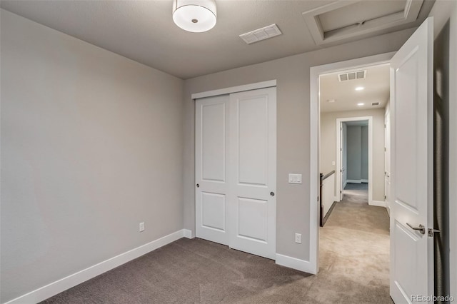 5185 Vivian St, Wheat Ridge, CO 80033 - unfurnished bedroom with attic access, carpet, baseboards, and a closet