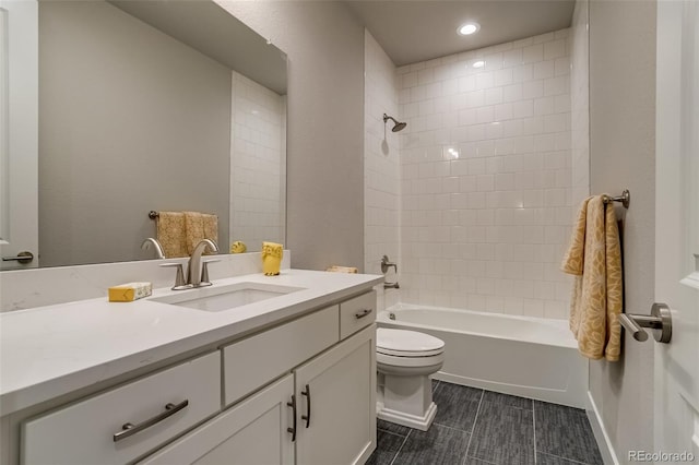 5185 Vivian St, Wheat Ridge, CO 80033 - full bathroom featuring vanity, toilet, tile patterned floors, shower / tub combination, and recessed lighting