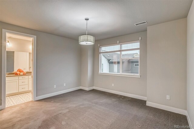 5185 Vivian St, Wheat Ridge, CO 80033 - unfurnished room featuring carpet floors and baseboards