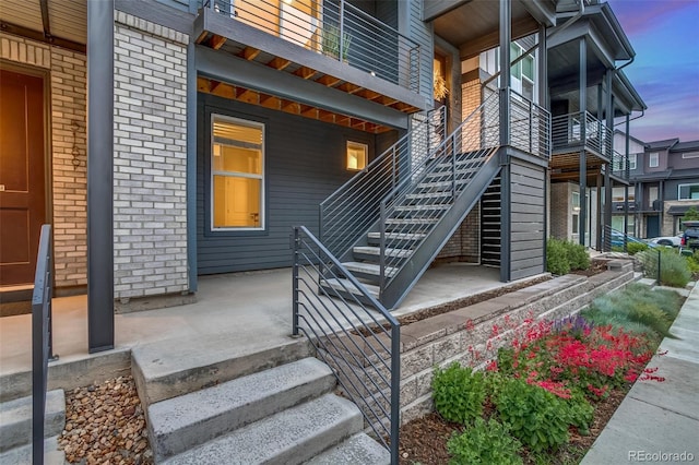 5185 Vivian St, Wheat Ridge, CO 80033 - property entrance featuring brick siding