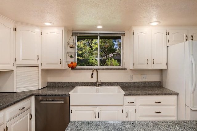 10366 E Ida Ave, Greenwood Village, CO 80111 - kitchen featuring dishwasher, a sink, freestanding refrigerator, white cabinets, and a textured ceiling