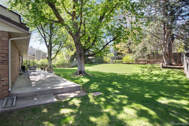 10366 E Ida Ave, Greenwood Village, CO 80111 - view of yard featuring a patio