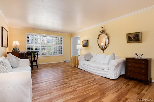 10366 E Ida Ave, Greenwood Village, CO 80111 - living room featuring light wood-type flooring, ornamental molding, and baseboards
