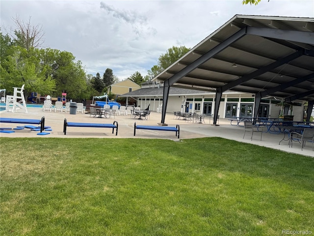 10366 E Ida Ave, Greenwood Village, CO 80111 - view of community with a lawn, a pool, and a patio area