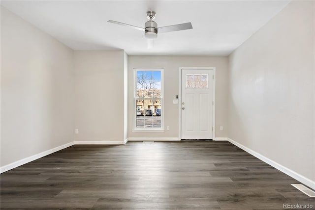 entryway featuring ceiling fan and dark hardwood / wood-style flooring