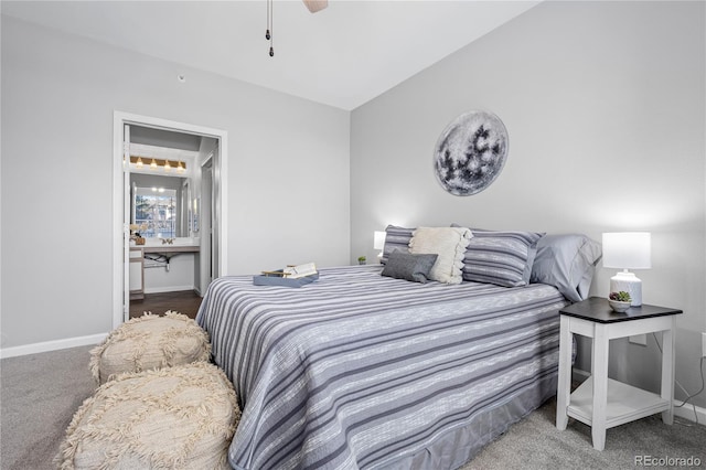 bedroom with ceiling fan, lofted ceiling, and carpet flooring