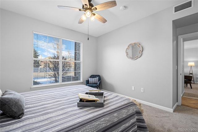 bedroom featuring ceiling fan and carpet floors