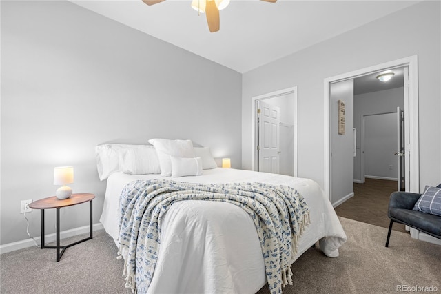 carpeted bedroom with ceiling fan and lofted ceiling