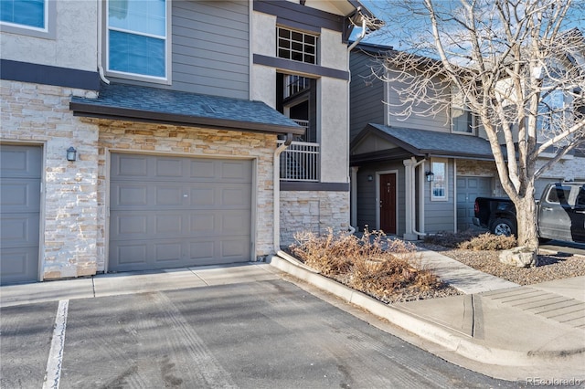 view of front of property with a garage