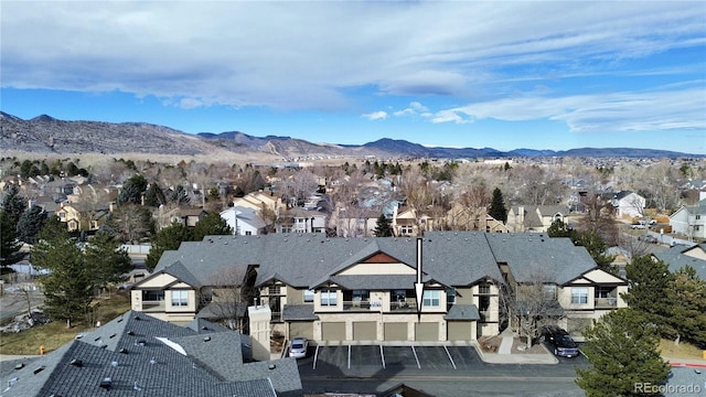 aerial view with a mountain view and a residential view