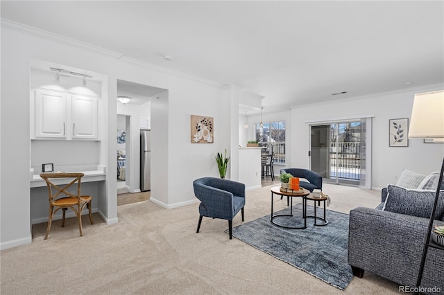 living room featuring crown molding and light carpet