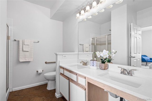 bathroom with toilet, tile patterned floors, an enclosed shower, and vanity