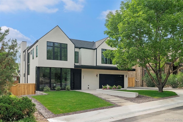 171 S Dexter St, Denver, CO 80246 - view of front of property with stucco siding, concrete driveway, and an attached garage