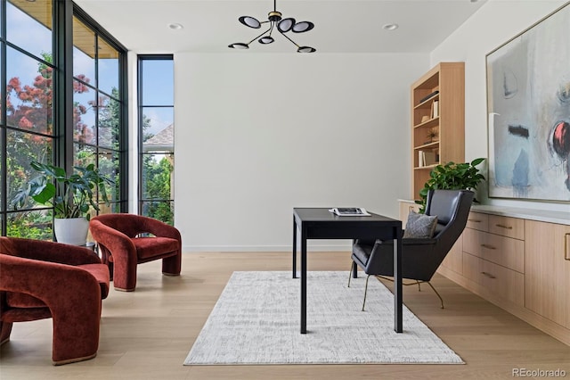 171 S Dexter St, Denver, CO 80246 - office with light wood finished floors, expansive windows, and a chandelier