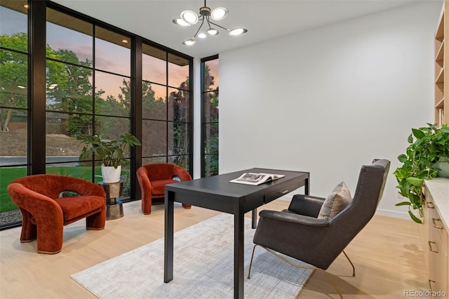 171 S Dexter St, Denver, CO 80246 - office area with floor to ceiling windows, wood finished floors, and a chandelier