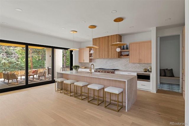 171 S Dexter St, Denver, CO 80246 - kitchen featuring open shelves, light brown cabinets, light countertops, light wood-type flooring, and recessed lighting