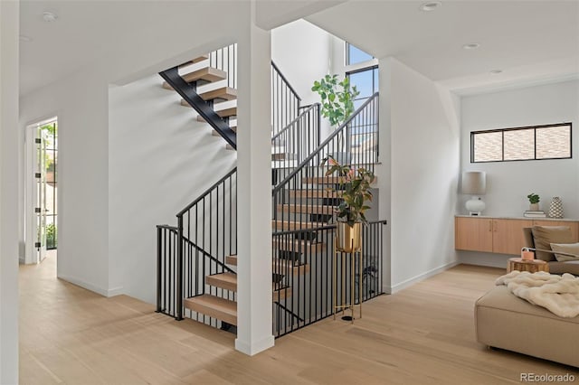 171 S Dexter St, Denver, CO 80246 - stairs with wood finished floors and recessed lighting