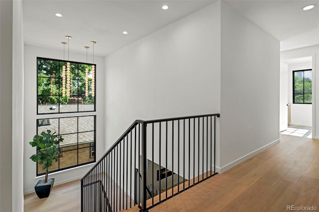 171 S Dexter St, Denver, CO 80246 - stairs with wood finished floors and recessed lighting